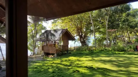 Aundanao Oasis Beach Отели рядом с достопримечательностью «Island Garden Baptist Tabernacle»