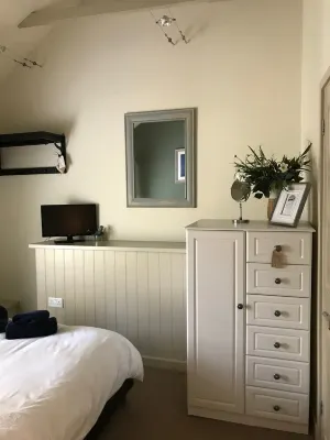 Two Bedroom Loft Apartment Overlooking St Fimbarrus Church & Its Grounds Hotels near Tremeer Farm - Yurt Glamping Holidays in Cornwall, UK