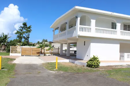 Spacious Beach Stay 3-bedroom House with Pool steps from the beach in Loiza