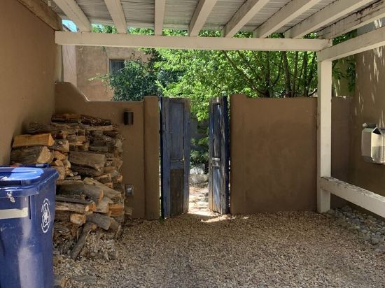 Luxurious and sanitized Studio, original adobe walls, wood floor, real sanctuary