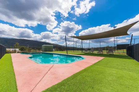 Clarendon Forest Retreat Отели в г. Тари