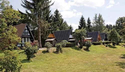 Wooden Chalet with Terrace Near Swimming Lake