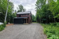 Newly built custom home nestled on the edge of the Bigelow Preserve