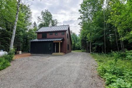 Newly built custom home nestled on the edge of the Bigelow Preserve