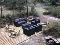 Wooden house in the golf, between forest, lake and ocean