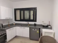 Enjoy 4bedroom villa @ swanlake north coast Hotels in Qesm Ad Dabaah