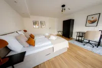 Highlight in Mühldorf - Come4stay Stadtblick - 2 Zimmer Wohnung I bis zu 4 Gäste Hotels in Muhldorf