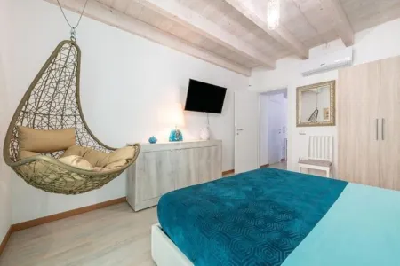 Apartments La perla - Apartment with Balcony Отели в г. Carloforte