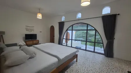 Hanara Bohemian Villas Отели рядом с достопримечательностью «Curug Tilu»