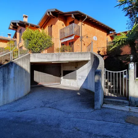 House in Luino with Green Garden and City Views