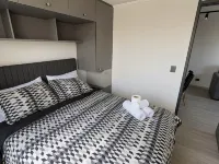 Oceana Suites Ñuñoa 中央 拉斯托雷斯附近的飯店
