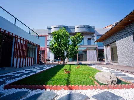 Floral Hotel·Beijing Expo Park,Yake Leisure Hotel Отели рядом с достопримечательностью «Guishui Park»