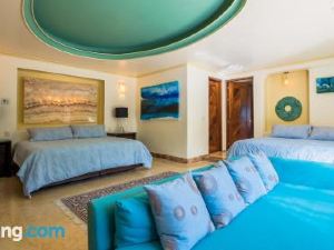 Luna Suite with Two King Size Beds, with Walk Out Terrace Overlooking the Beach