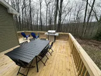 Secluded mountain home on over 10 wooded acres, modern, WiFi and pet friendly!