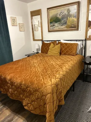 Near Kansas City Area Cottage with a Fire Pit! Comfy Beds and a Stocked Kitchen.
