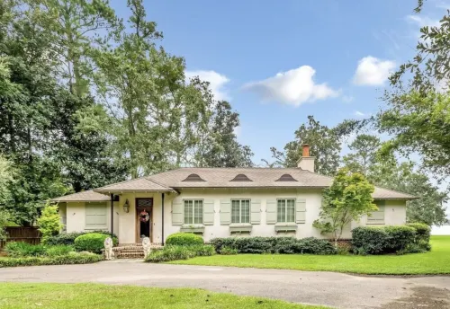 Cozy, French Cottage with Fishing Pier and Sunset View on Dog River