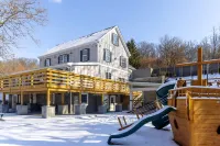 Historic Estate on a Serene Pond, Complete with Sauna, Jacuzzi, and Playground
