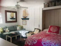 Magical Waterfront Home, Sunsets,Guest House, Beach, Dock, game room, Playground