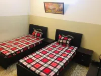 Four Season Guest House Hotels in Shah Faisal Town
