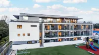 Sunrise Garden Suites Hotel in zona Browns Bay Beach