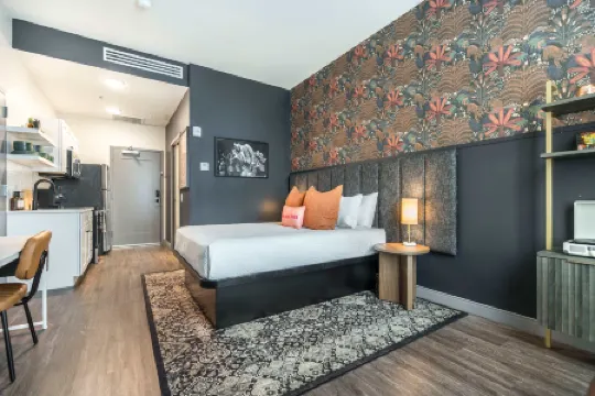 Floor-to-Ceiling Windows and Full Kitchen - Moody Chic Retreat