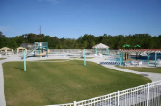 Community Pool and Covered Deck - Charming Coastal Haven