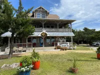 Harbor and Lighthouse Views with Spacious Porch - Charming Coastal Haven