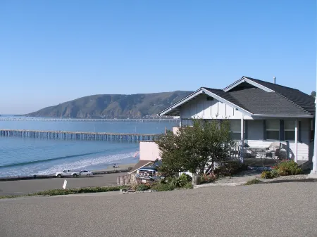 Panoramic Ocean Views and Outdoor Heated Pool - Charming Coastal Retreat