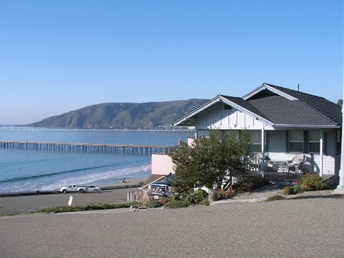 Panoramic Ocean Views and Outdoor Heated Pool - Charming Coastal Retreat