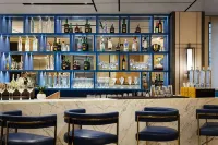 Ramada Encore by Wyndham Siliguri Sevoke Road - bar