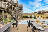 Sleeps 28 Beachfront w Pool Hot Tub Game Room Atlantic Watch by AvantStay