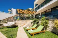 Hillside sea view family villa with stunning views and close to town