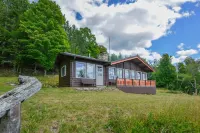 Rustic chalet - directly on the lake with sandy beach