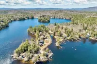 Waterfront Winnipesaukee 3 BR / 2 BA Cottage with Private Dock and Sandy Beach