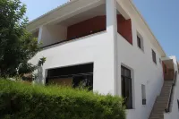 Two very large, bright apartment with private garden, pool and grill Hotels in 