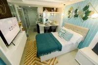 Charming unit at Azure North Staycation Man-Made Beach, Wave Pool