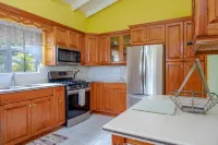 Two bedroom, 2 bathroom house in a tropical palm and garden setting.