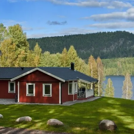 Comfortable holiday home in exclusive location, only 150 m to an own beach