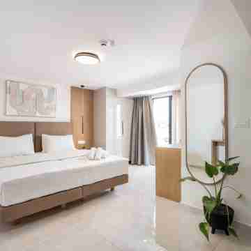 Unicos City Suites Rooms