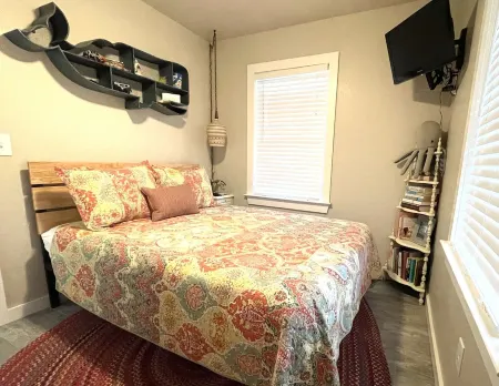 Carova Beach Canal Front Cottage   4x4 required Beach Parking Pass provided