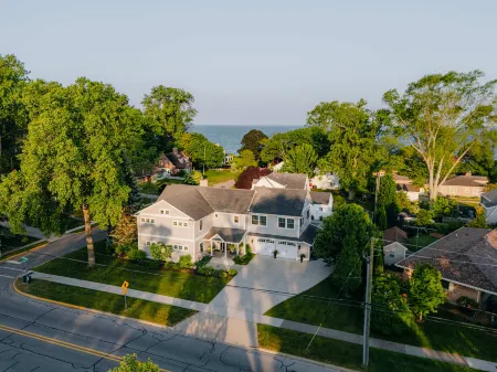 Resort-Style Backyard with Hot Tub and Game Rooms - Charming Lakeside Retreat