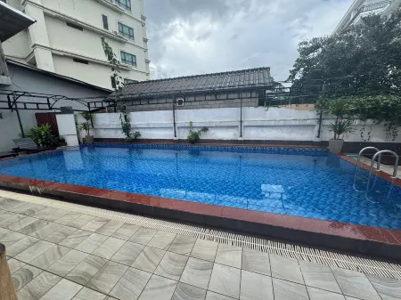 Vang Vieng Golden Lotus Hotel Отели в г. Ванг Вьенг