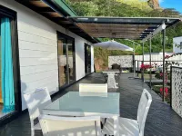 Bungalow with magnificent lagoon and mountain views, in a natural setting