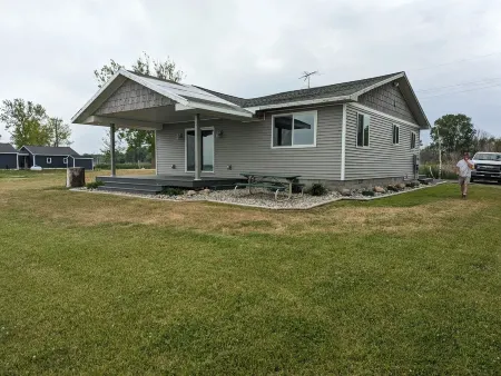 CABIN ON THE  SAGINAW BAY