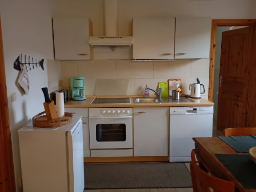 Vacation apartment near the national park and harbor with terrace and parking space