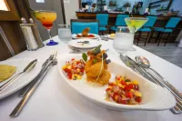 託巴哥的舒適酒店客房和套房 - 早餐