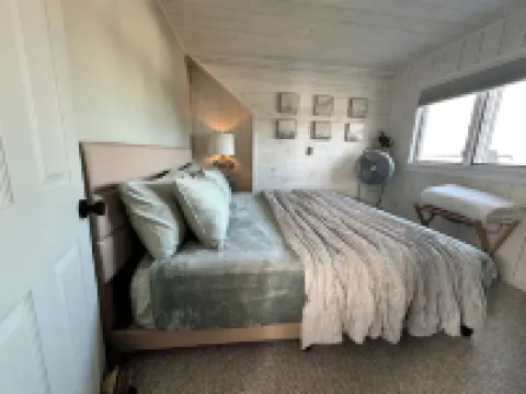 Short walk to the beach! See & hear the ocean in the distance. Great living area