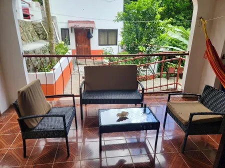 Papaya Guesthouse Отели рядом с достопримечательностью «Иден Айленд, Сейшелы»