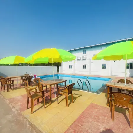 Riverside Retreat Dombivli - Swimming Pool - Couple Friendly - Comfortable Stay