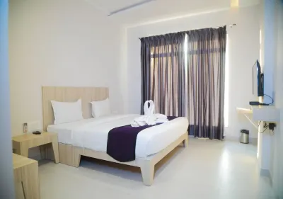 Hotel Milan Hoteles cerca de Riyaz General Store